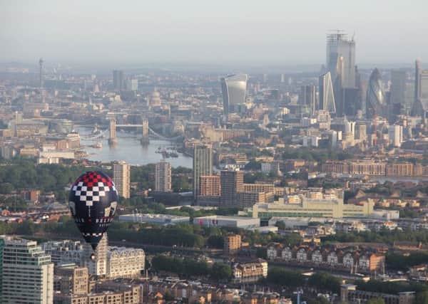 The Belvoir Brewery balloon flies over the city of London in the Ricoh Lord Mayors Hot Air Balloon Regatta
PHOTO MARCUS GREEN EMN-190621-163823001