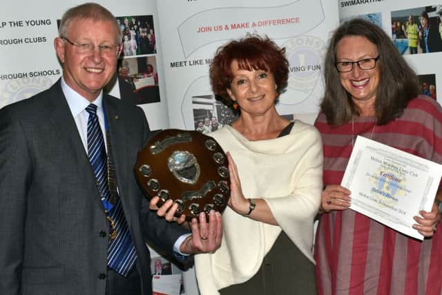 The Pearce's Jewellers Achievement and Endeavour Award was won by Helen's Heroes and presented by Lions President Conroy Godber PHOTO: Tim Williams