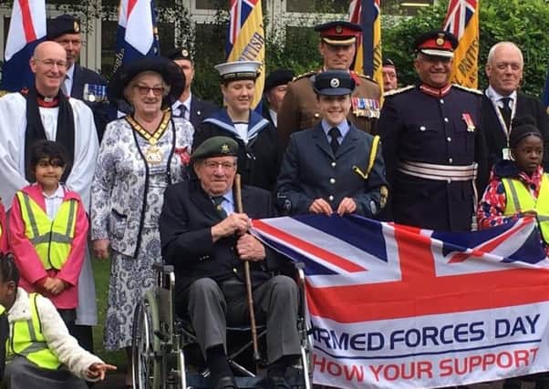 Leicestershire County Council chair, Councillor Pam Posnett, with he father-in-law, Jim Posnett, a 100-year-old war veteran, and other guests at Monday's Armed Forces Day ceremony at County Hall EMN-190626-103356001