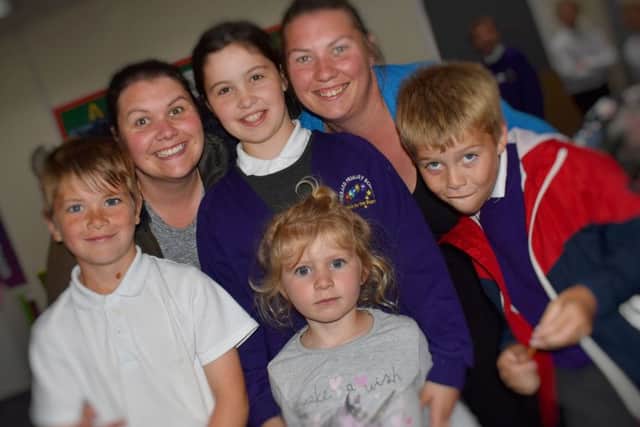 Mums and their children who have all attended Sherard Primary School enjoy the school's 50th birthday party EMN-190628-092826001