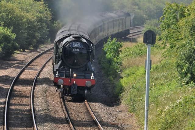 The Flying Scotsman heads away from Langham
PHOTO PAUL DAVIES EMN-190207-134654001