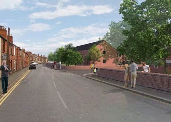 An artist's impression of what the planned redevelopment of Melton's old St Mary's Hospital site might look like from Thorpe Road EMN-190907-121813001