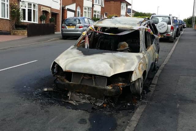 A Ford Mondeo destroyed by an arson attack in The Crescent in August 2016 - one of two cars sets alight deliberately in separate incidents five minutes apart in Melton EMN-191007-104349001