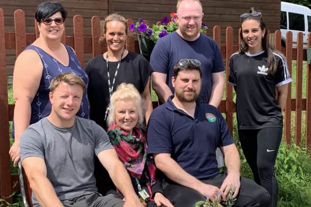 Sarah Andrew, front row second from left, with colleagues at The Melton Learning Hub - she has retired after 42 years teaching in the town EMN-191107-152938001