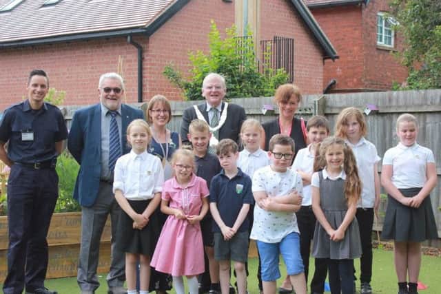 Mayor of Melton, Councillor Malise Graham, joins pupils and staff at Asfordby Hill Primary School's new sensory garden EMN-191107-164104001