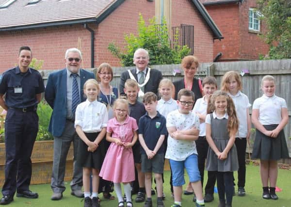 Mayor of Melton, Councillor Malise Graham, joins pupils and staff at Asfordby Hill Primary School's new sensory garden EMN-191107-164104001