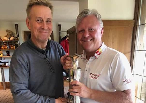 Stapleford Park club champion John Rawlings (right) with Head of Golf Peter Sargent EMN-190714-112930002