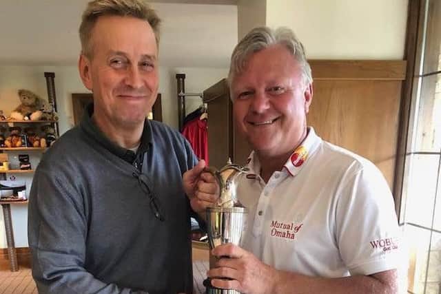 Stapleford Park club champion John Rawlings (right) with Head of Golf Peter Sargent EMN-190714-112930002