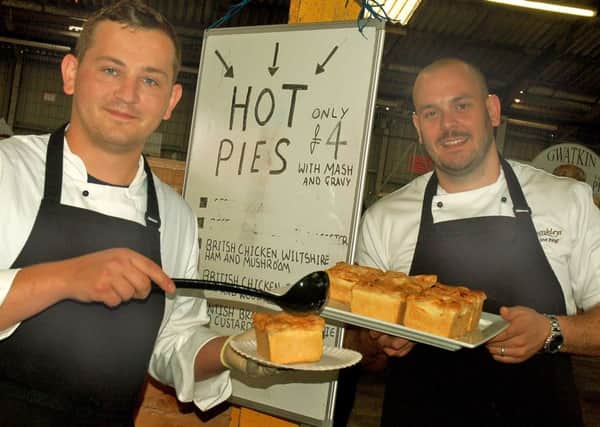 Dunkleys chefs Ethan Barrett and Chet Willcock serving up hot pies PHOTO: Tim Williams