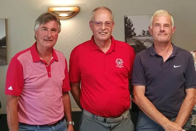 Pete Rayers and Brian Shilham, two-thirds of the winning team, with senior captain Dick Chapman (centre) EMN-190718-163110002