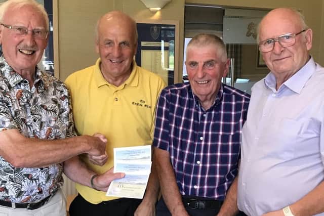 From left - seniors captain Cliff Mills and the winning team of Phil White, Phil Hewes and Ken Taylor EMN-190723-102248002