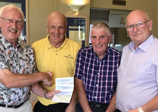 From left - seniors captain Cliff Mills and the winning team of Phil White, Phil Hewes and Ken Taylor EMN-190723-102248002