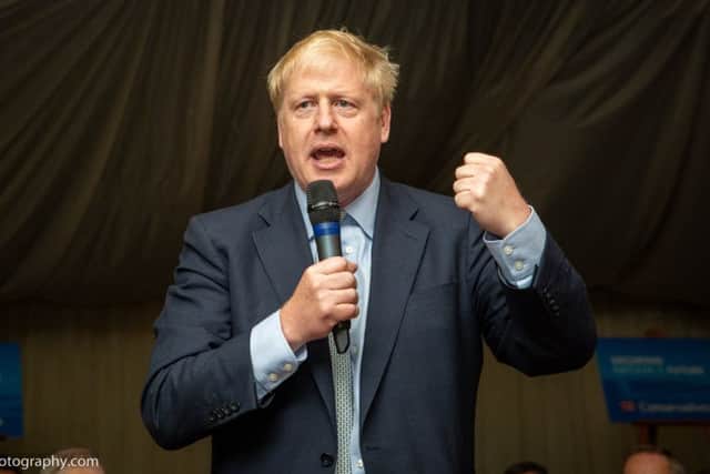 Tory leadership candidate Boris Johnson makes a speech at Melton Livestock Market at a fundraising dinner in June
PHOTO Lincs Photography Ltd EMN-190723-131159001