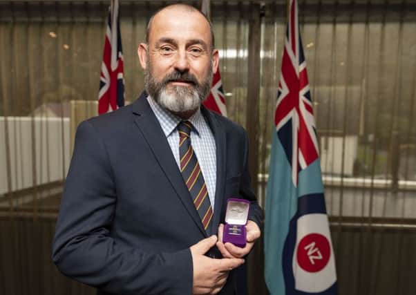 Former Melton man Alan Inkpen with his Chief of Defence Force Commendation medal awarded by the New Zealand Defence Force (NZDF) for his outstanding contribution to their Explosive Detection Dog programme EMN-190723-151934001