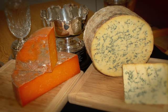 Long Clawson Dairy's champion cheeses from the 2018 Melton Fatstock Show, Blue Stilton and Rutland Red EMN-190724-131354001