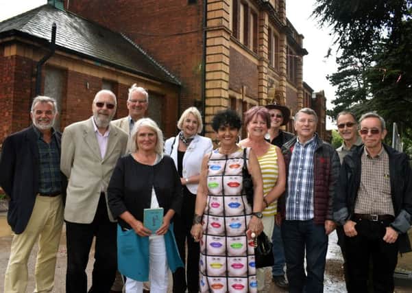 Former students from King Edward VII Upper School reunite 50 years later outside the entrance to the former school EMN-190731-120534001