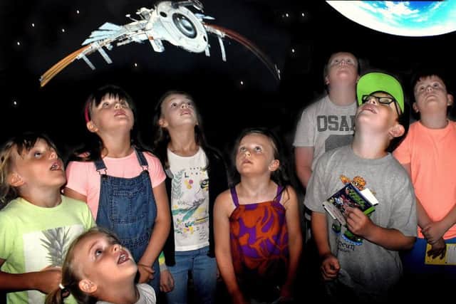 Youngsters enjoy The Planetarium at Melton Library EMN-190731-141705001