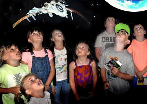 Youngsters enjoy The Planetarium at Melton Library EMN-190731-141705001