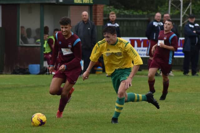 Holwell's new signing Alfie Gaughan in action against Radford EMN-190731-104908002