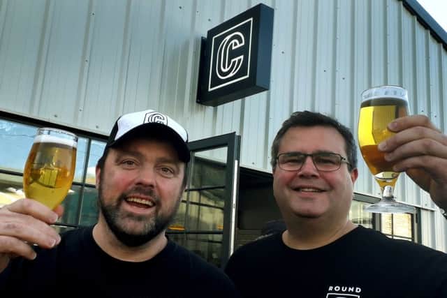 Round Corner Brewing CEO and co-founder Combie Cryan (left) with head brewer Colin Paige EMN-190108-160025001