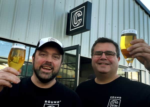 Round Corner Brewing CEO and co-founder Combie Cryan (left) with head brewer Colin Paige EMN-190108-160025001
