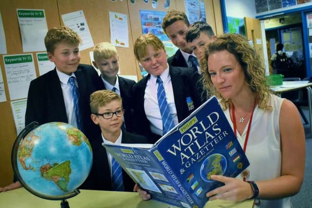 Long Field Academy teacher, Jenny Turner, Melton's first 'climate change teacher', goes over some points with pupils EMN-190309-154257001