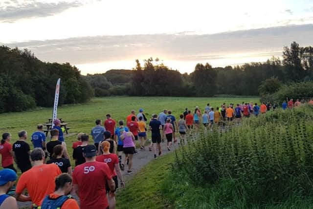 Some of the early runners take part in Saturday's five back-to-back Parkruns in Melton Country Park EMN-190309-173905001
