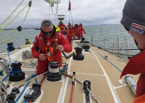 Redmile villager Andy Harrhy pictured training on a yacht before taking part in the Clipper Round the World Yacht Race EMN-190409-163452001