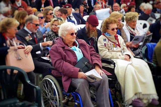 Guests look on at the ceremony to unveil the memorial to the 10th Battalion, the Parachute Regiment, at Burrough on the Hill EMN-191009-154352001