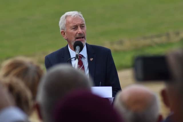 Friends of the Tenth chairman, Alec Wilson, makes a speech at the ceremony to unveil the memorial to the 10th Battalion, the Parachute Regiment, at Burrough on the Hill EMN-191009-154510001