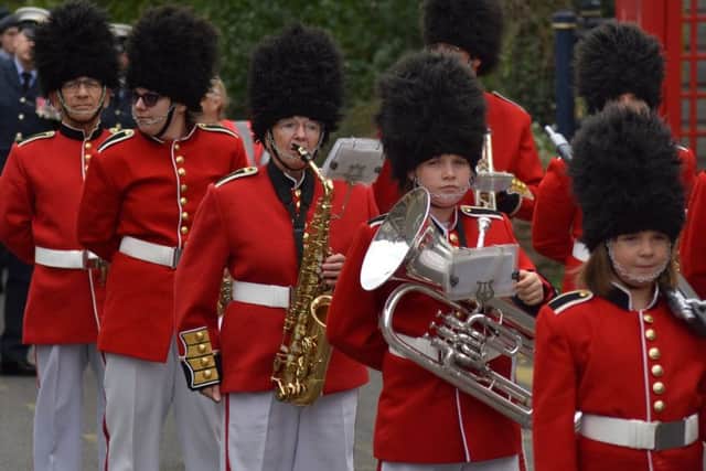 Melton Battle of Britain Parade 2019 - the Melton Toy Soldiers Band leads the parade through town EMN-190916-133953001