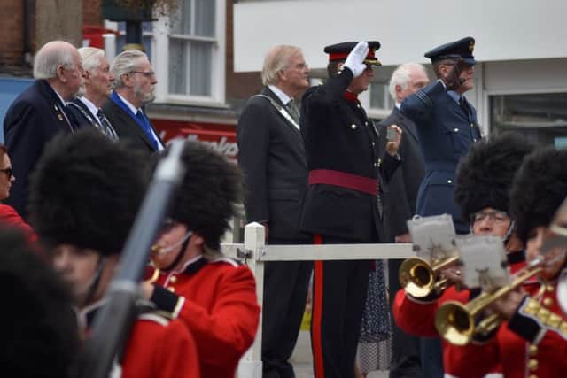 Melton Battle of Britain Parade 2019 - the salute is taken in Market Place by Sqn Ldr Stuart Gould EMN-190916-134026001