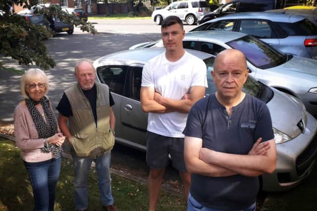 Brian Ellis with other disgruntled residents who are fed up with motorists using their car park on Chapel Street, Melton EMN-190918-105440001