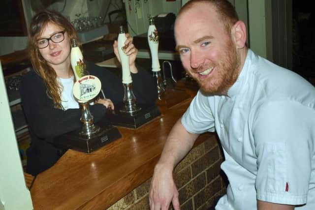 Dom Clarke, with partner Antonia Nelmes, at The Stag and Hounds pub at Burrough on the Hill EMN-190916-174007001
