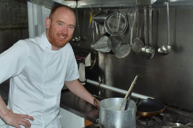 Dom Clarke in the kitchen at The Stag and Hounds pub at Burrough on the Hill EMN-190916-174019001