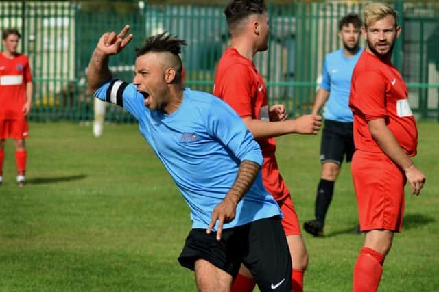 Captain Liam Ambrose celebrates after doubling Asfordby's lead EMN-190917-105336002