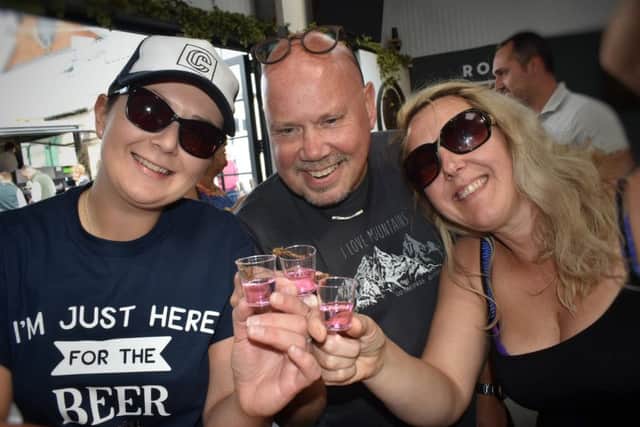 Frankie Devlin, Steve Murphy and Deb Addison are ready for their Brentingby Gin shots with scorpions EMN-190917-130131001