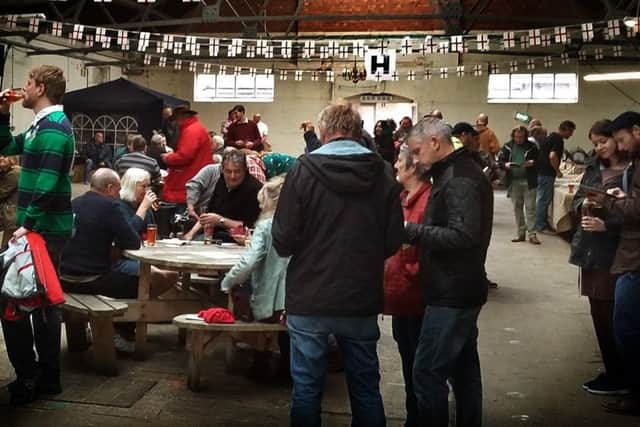 Real ale and cider fans pack out the Market Tavern at a beer festival in 2017 PHOTO: Tim Williams EMN-190917-171746001