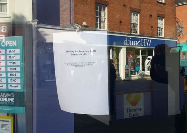 A notice on the door of the Thomas Cook shop in Melton announcing it is closed EMN-190923-120618001