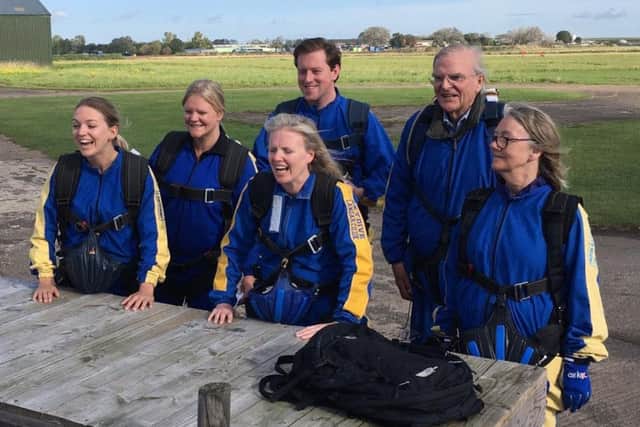 Melton Mayor, Malise Graham, and family members prepare for their parachute jump EMN-190924-122332001
