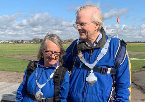 Melton Mayor, Malise Graham, and wife Pamela prepare for their parachute jump EMN-190924-122343001