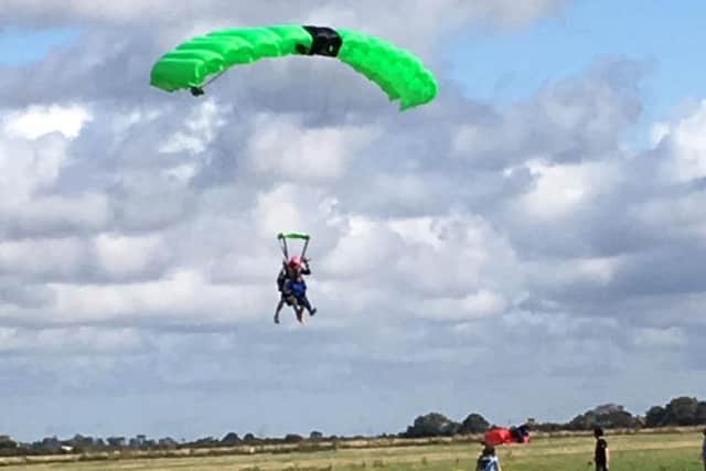 Mayor of Melton, Malise Graham, lands at Langar Airfield during his fundraising parachute jump EMN-190924-122353001