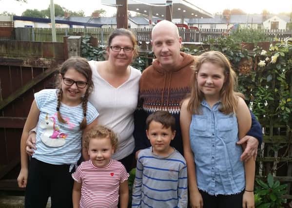Kim Hendy, fiancee Stephen Hall and children Kayla (12), Olivia (11), Harrison (7) and four-year-old Evelyn who have lost out on their dream holiday to Turkey following the collapse of Thomas Cook EMN-190925-093329001