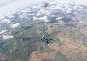 Mayor of Melton, Councillor Malise Graham, pictured doing his charity parachute jump EMN-190927-120910001