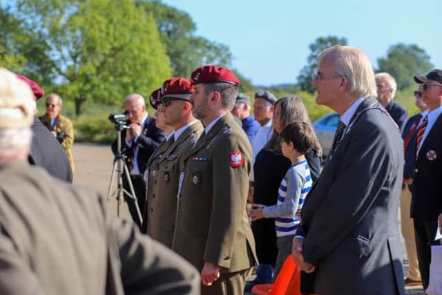 Mayor of Melton, Malise Graham pictured with members of the Polish military and other guests at a special service at Saltby Airfield to honour paratroopers from Poland who flew from there to fight in the Second World War EMN-190310-112706001