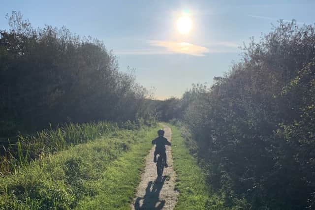 CJ Wood (7) who is taking on a cycling challenge for the MS Society to help sufferers like his dad EMN-190710-130406001
