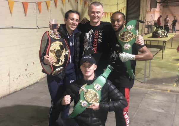 Commonwealth champions Thai Barlow (kneeling) and Tyree Stevens with world champion Iman Barlow and Assassins chief instructor Mark Barlow EMN-191016-081133002
