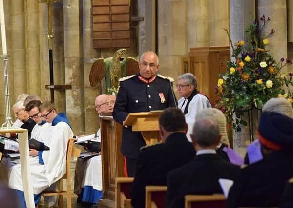 Lord Lieutenant of Leicestershire, Mike Kapur, reads the first lesson at the county service at St Mary's Church, Melton EMN-191014-105524001