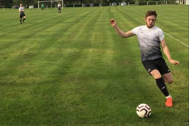 Rhys Hill stretches to cross EMN-191015-150602002