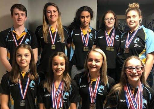 Melton Swimming Club senior/youth squad, from left, back - Alex, Lucy, Beth Fleur; front - Jess, Zoe Imogen, Amy EMN-191017-125800002